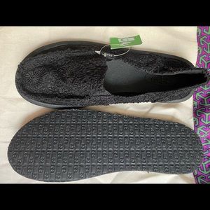 All black flower design brand new sanuks!